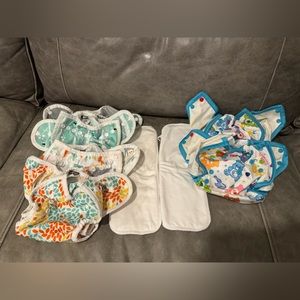 Thirsties diaper covers (woodland) and rumparooz diaper covers (Care Bears) LOT